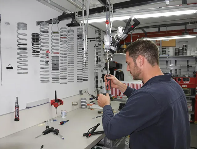 Buckeye Garage Door Repair safety certified technician performing precision spring replacement in Buckeye
